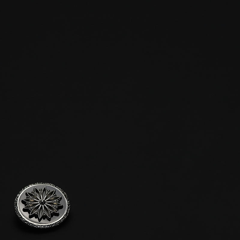 Cool-colored raised floral button