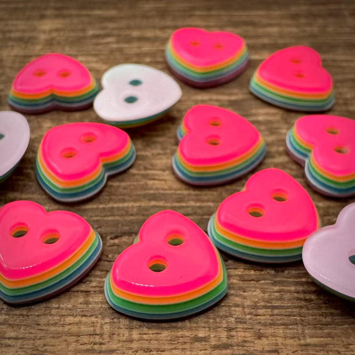 Layered heart two hole buttons with bright pink faces