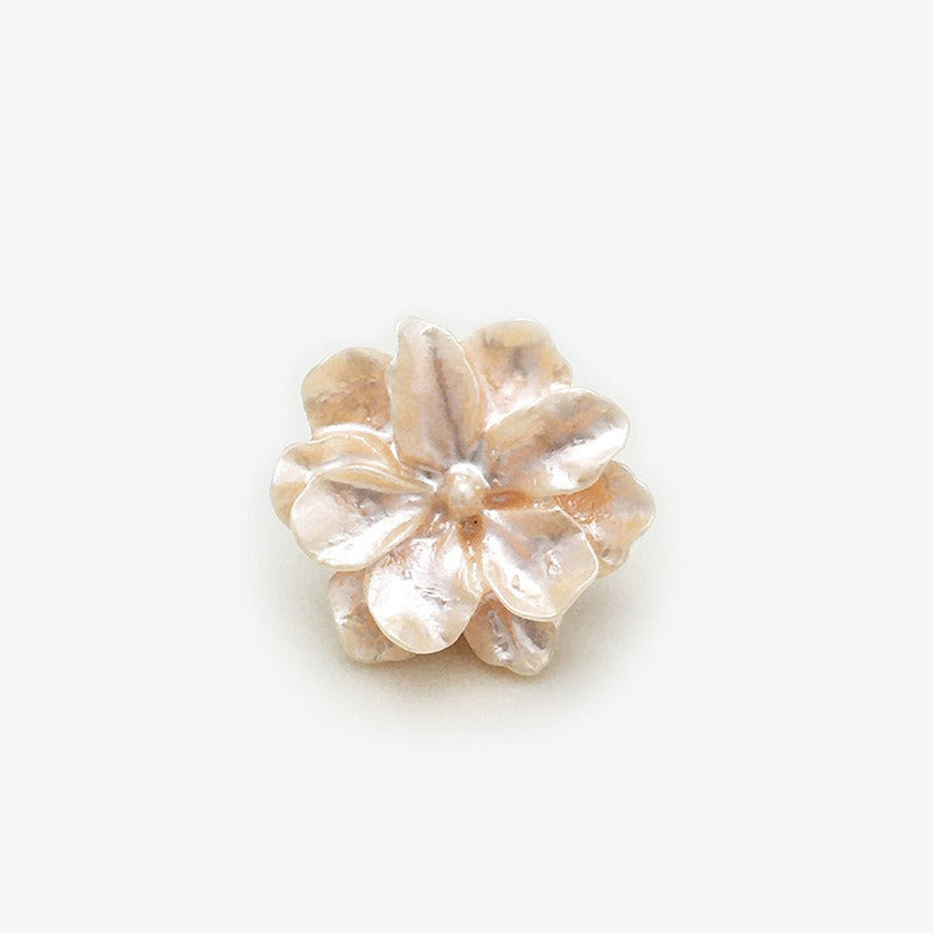 Orange sculpted blossom shank button front view