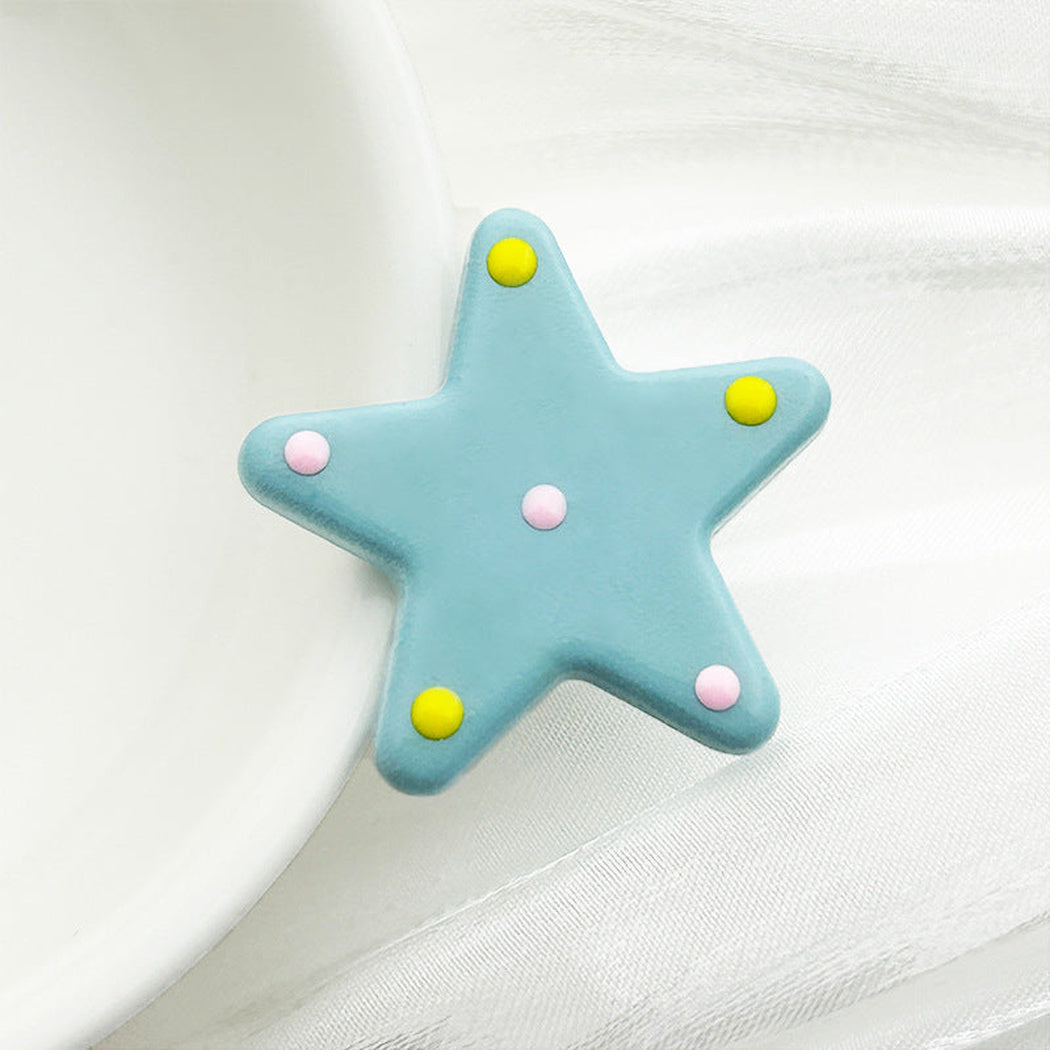 Blue polka dot star button