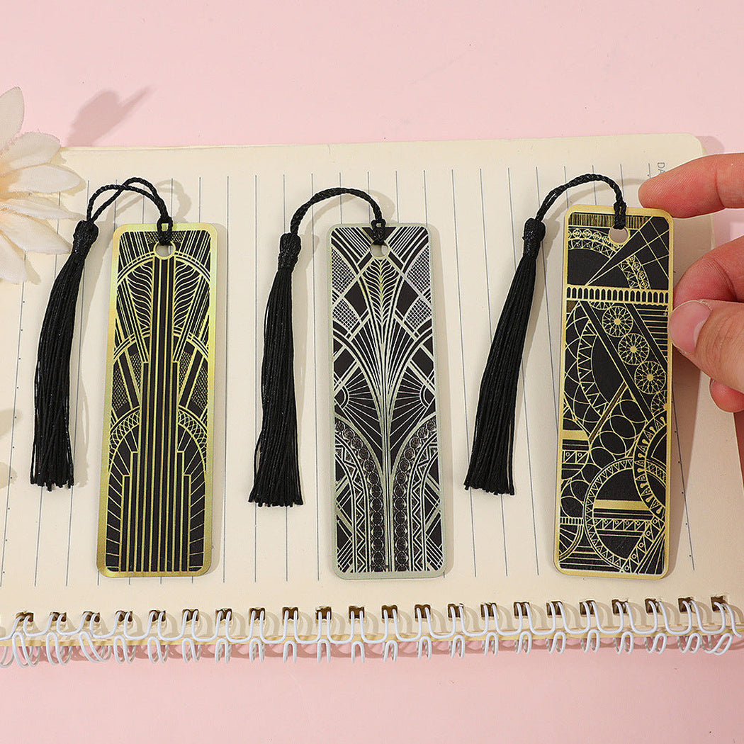 Three black and gold Art Deco bookmark styles