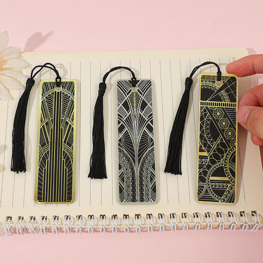 Three black and gold Art Deco bookmark styles