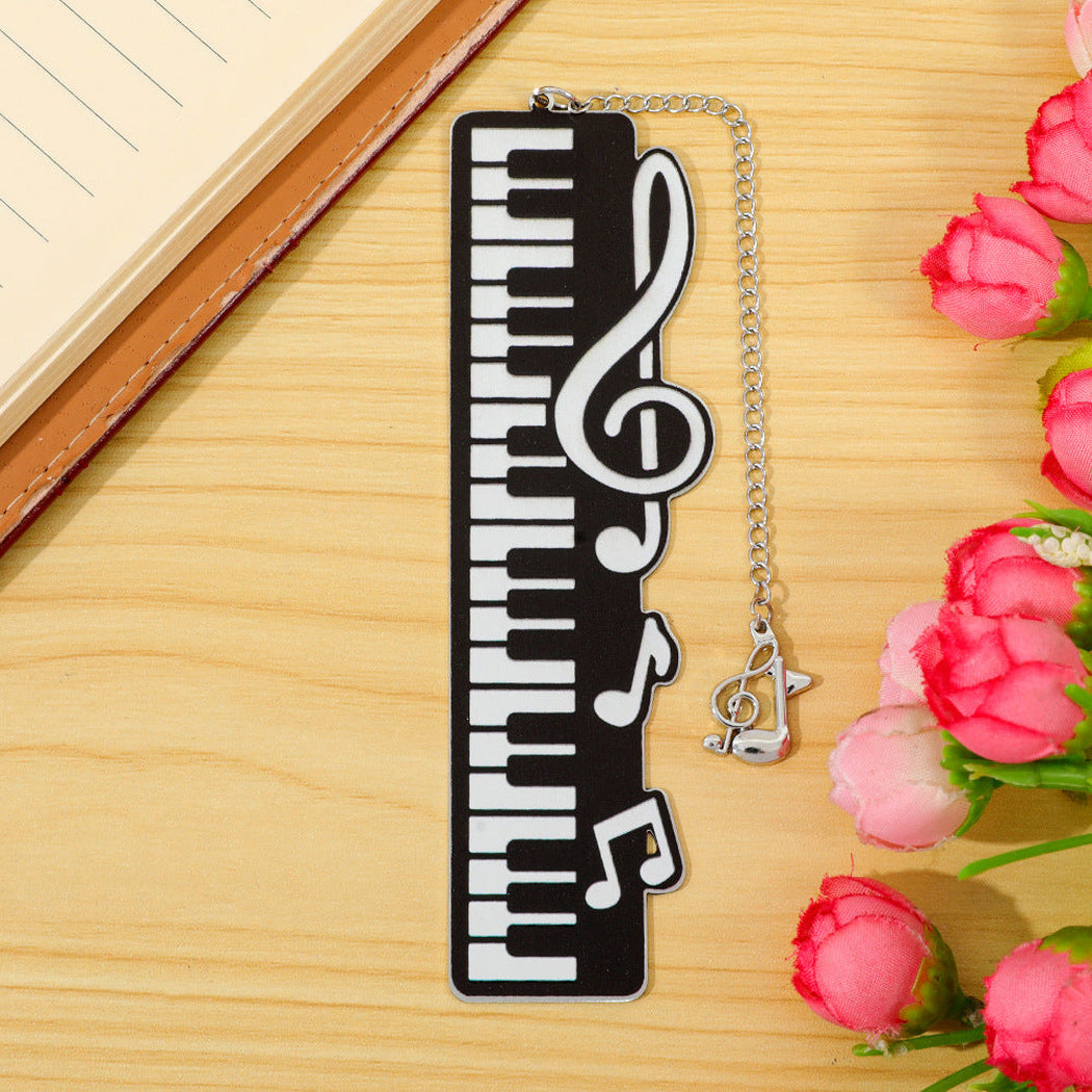 Black piano key and treble clef bookmark