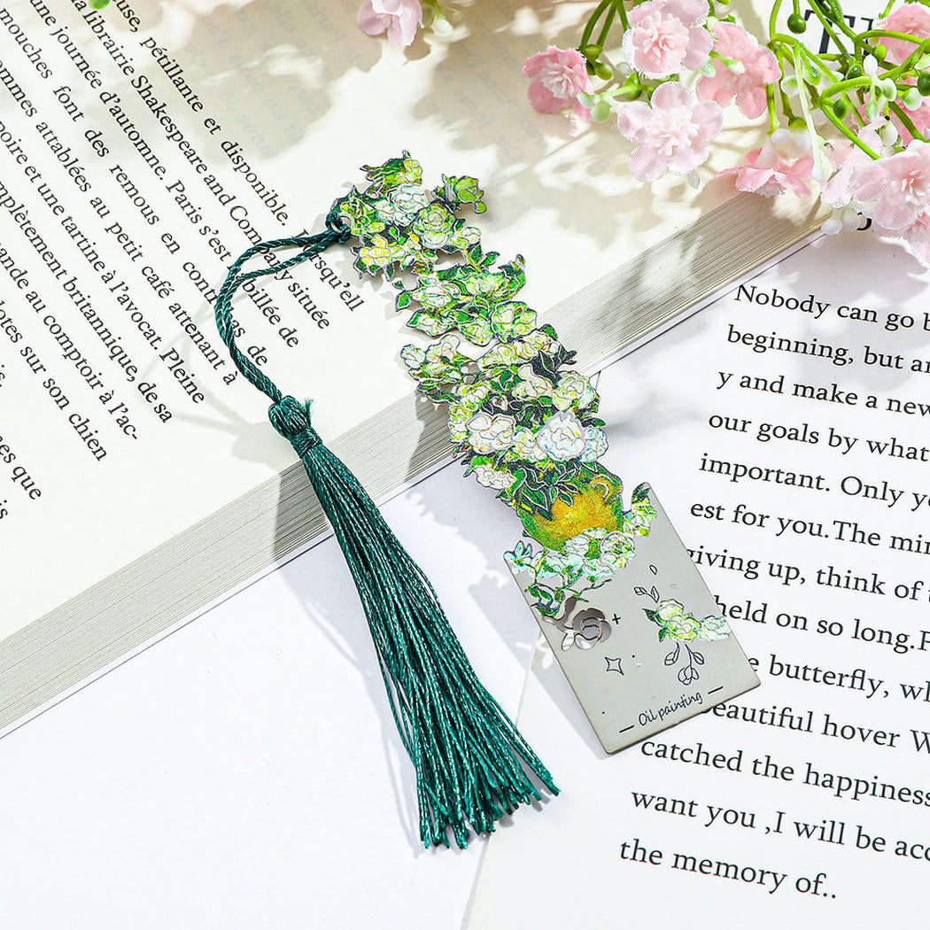 Art print bookmarks arranged beside flowers