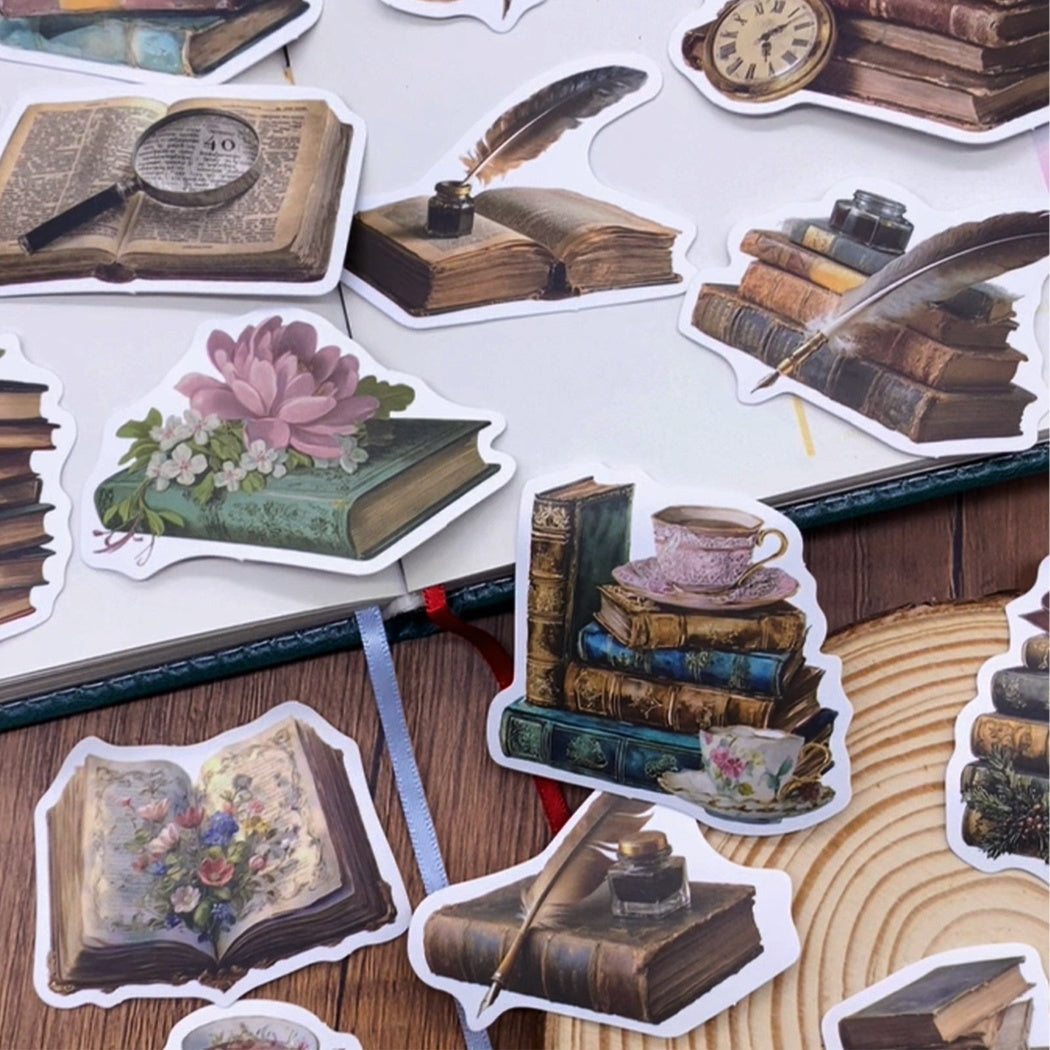 Book stickers decorating a phone case and drinkware