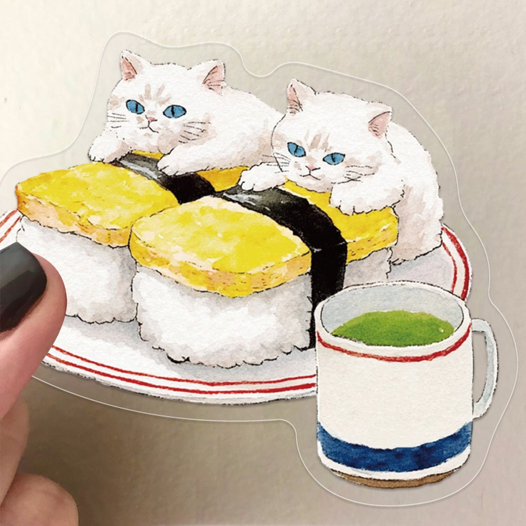 Cozy cat and food sticker close-up
