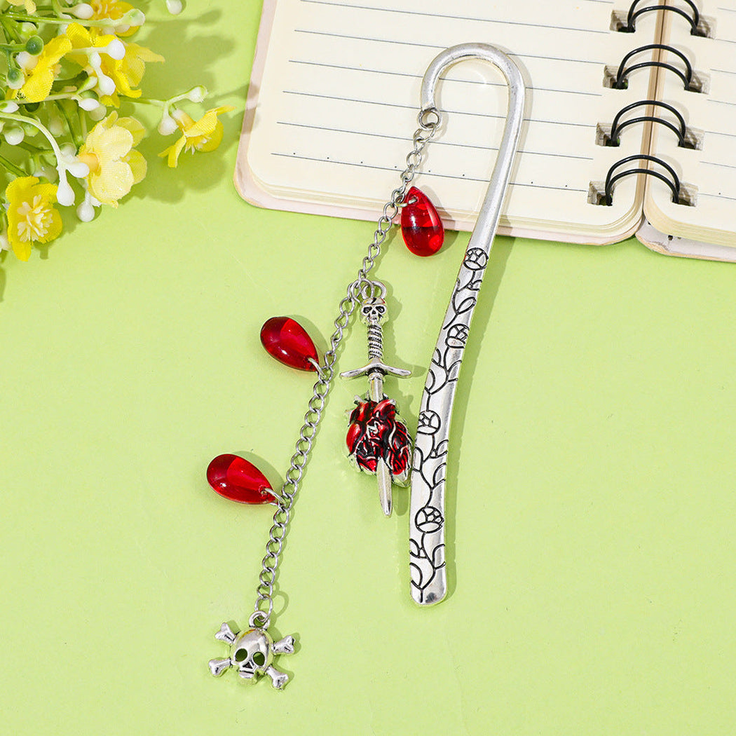 Two gothic charm bookmarks close-up