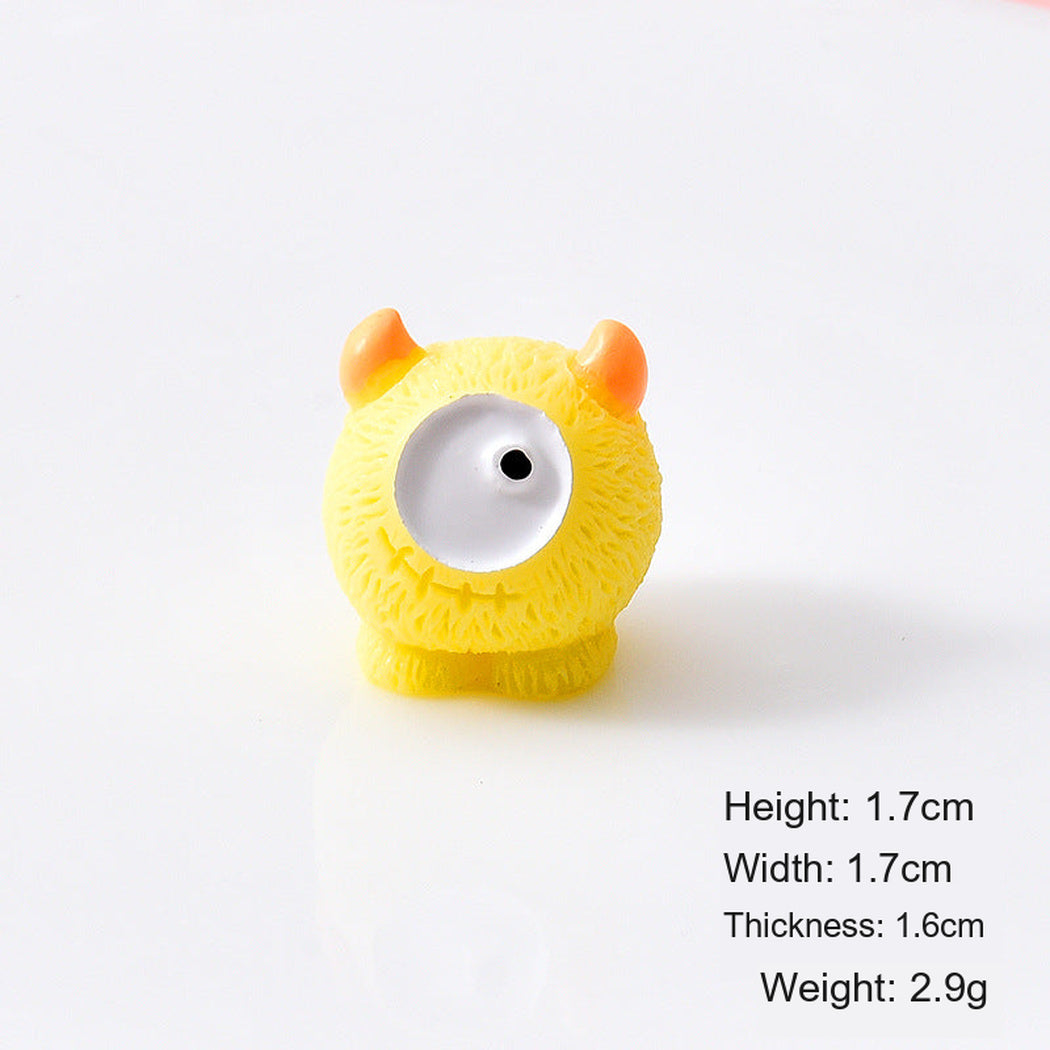 Yellow Colorful Round Monster Miniature Figurine, single variant view