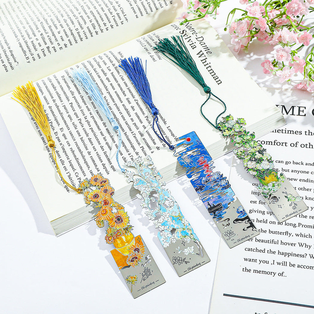 Four art print bookmarks displayed on a page