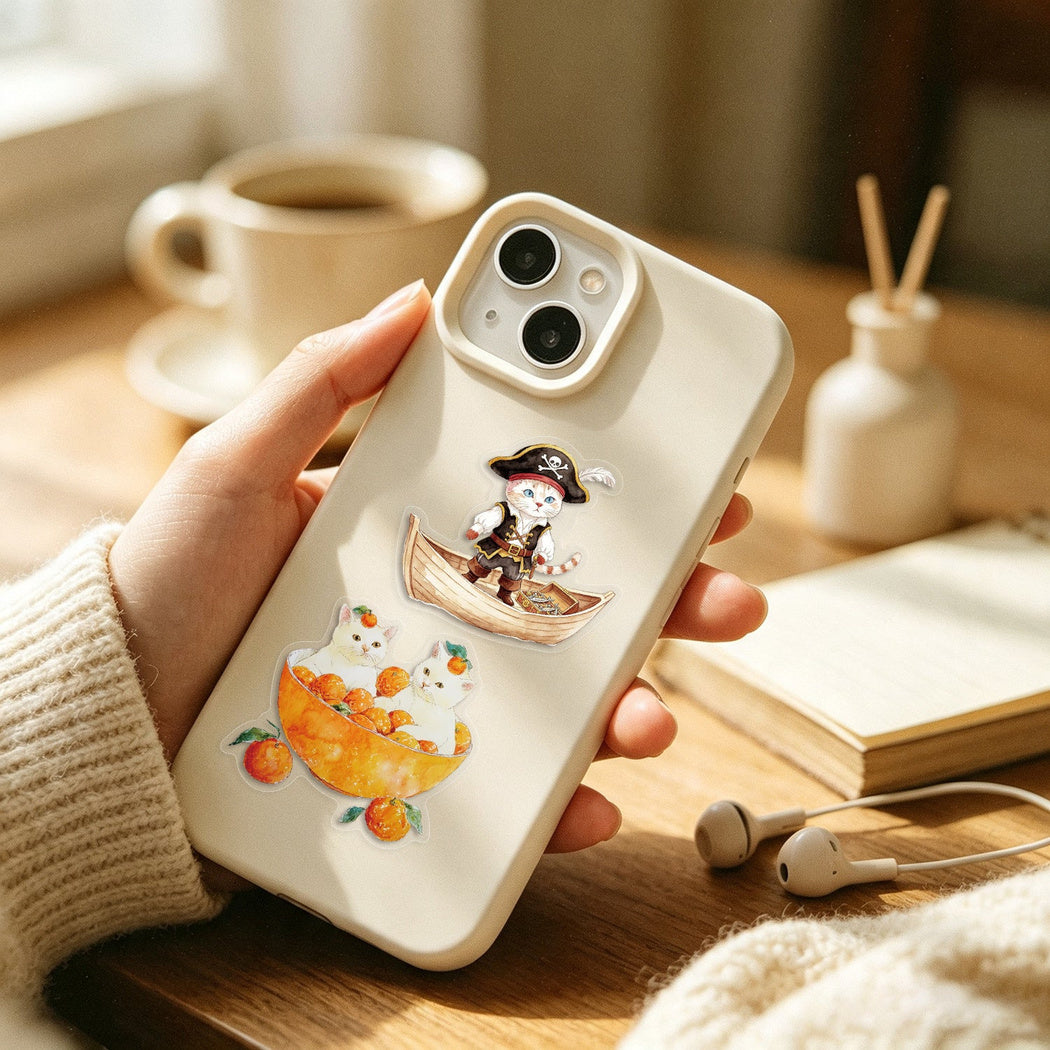 Cozy cat and food stickers shown in use