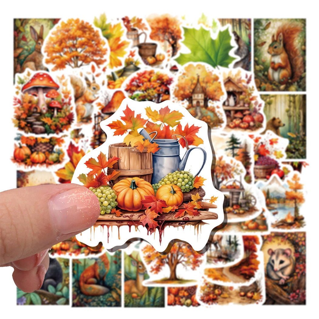Hand holding an autumn sticker assortment