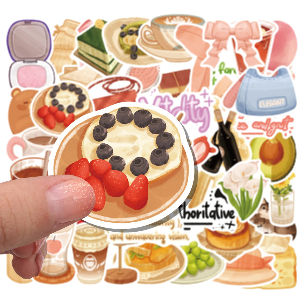 Hand holding a cafe food sticker assortment