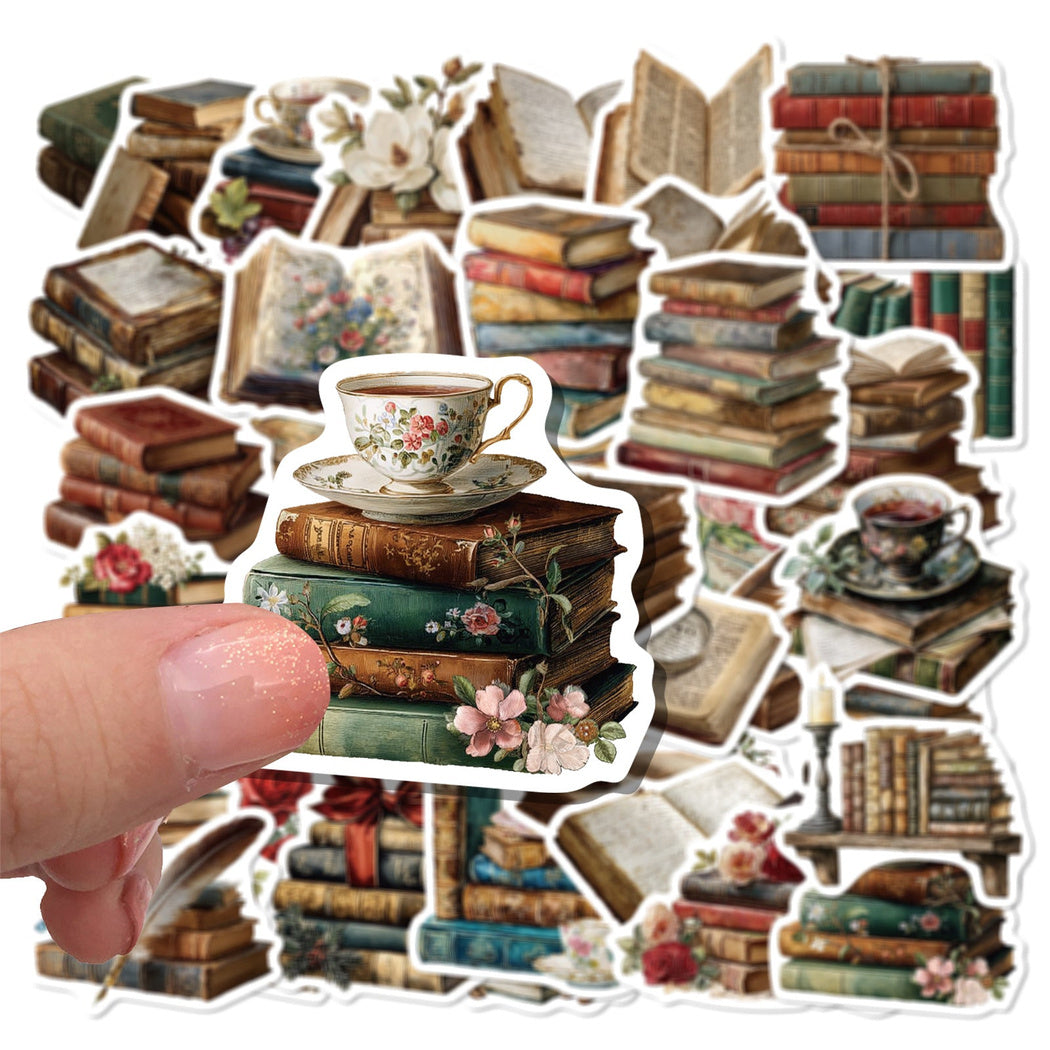 Hand holding a vintage book sticker assortment