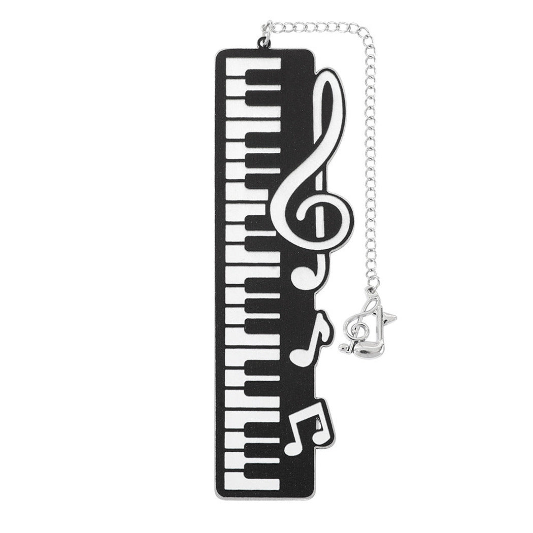 Piano key bookmark with dangling music note detail
