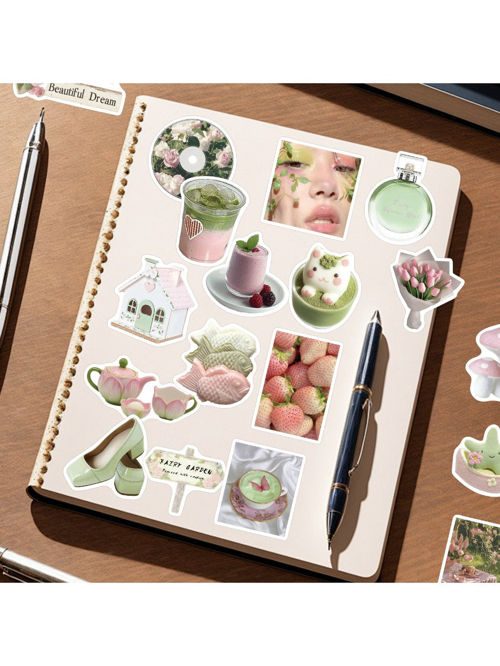 Close-up of assorted fruit stickers including strawberries, oranges, and cherries