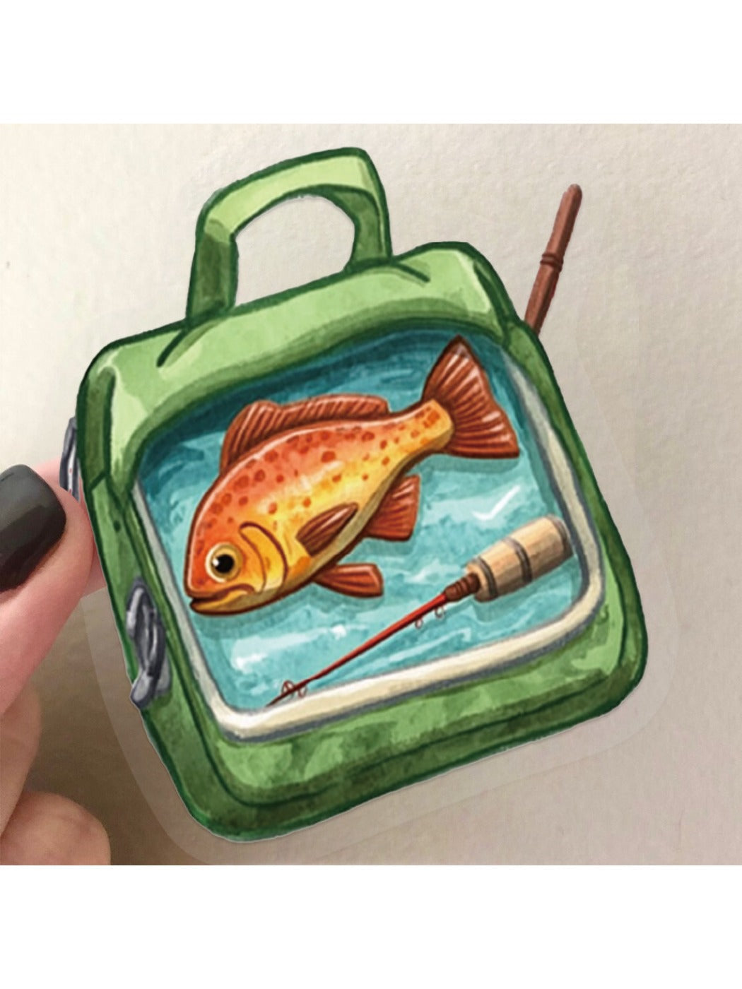 Watercolor sticker of a fisherman holding a large fish