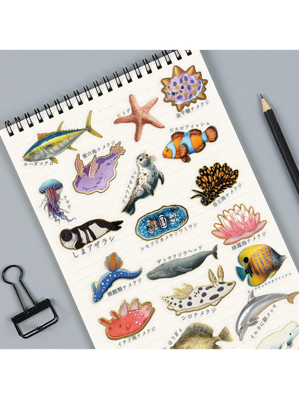 Lunira sticker pack displayed on a laptop with various sea animal designs