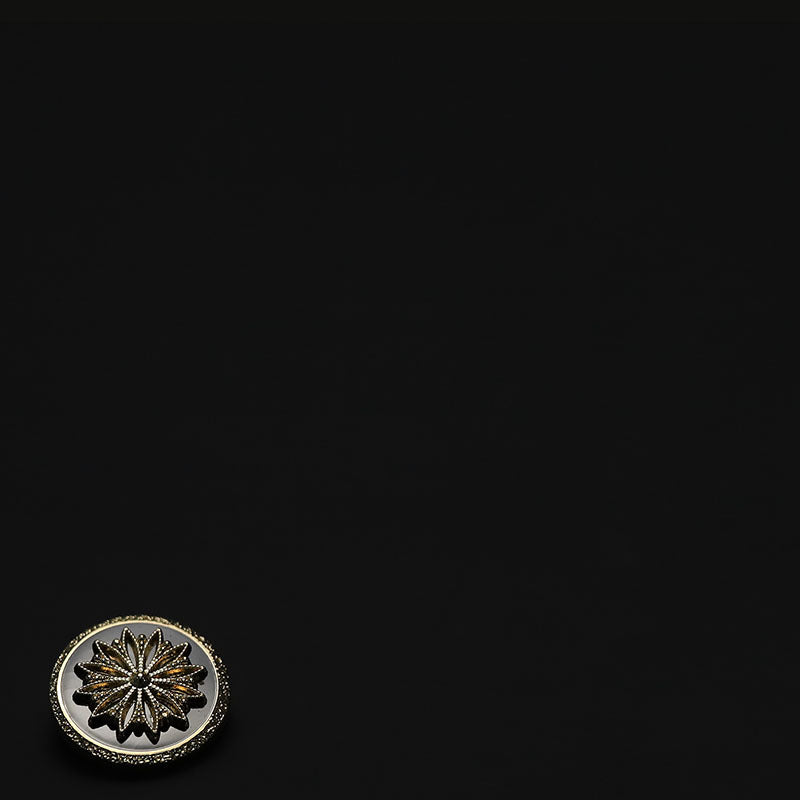 Warm-colored raised floral button