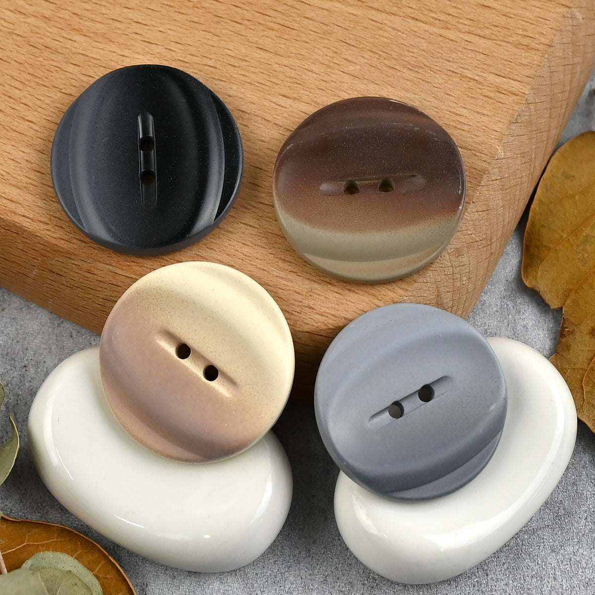 Four-color tonal-band buttons in a raised arrangement