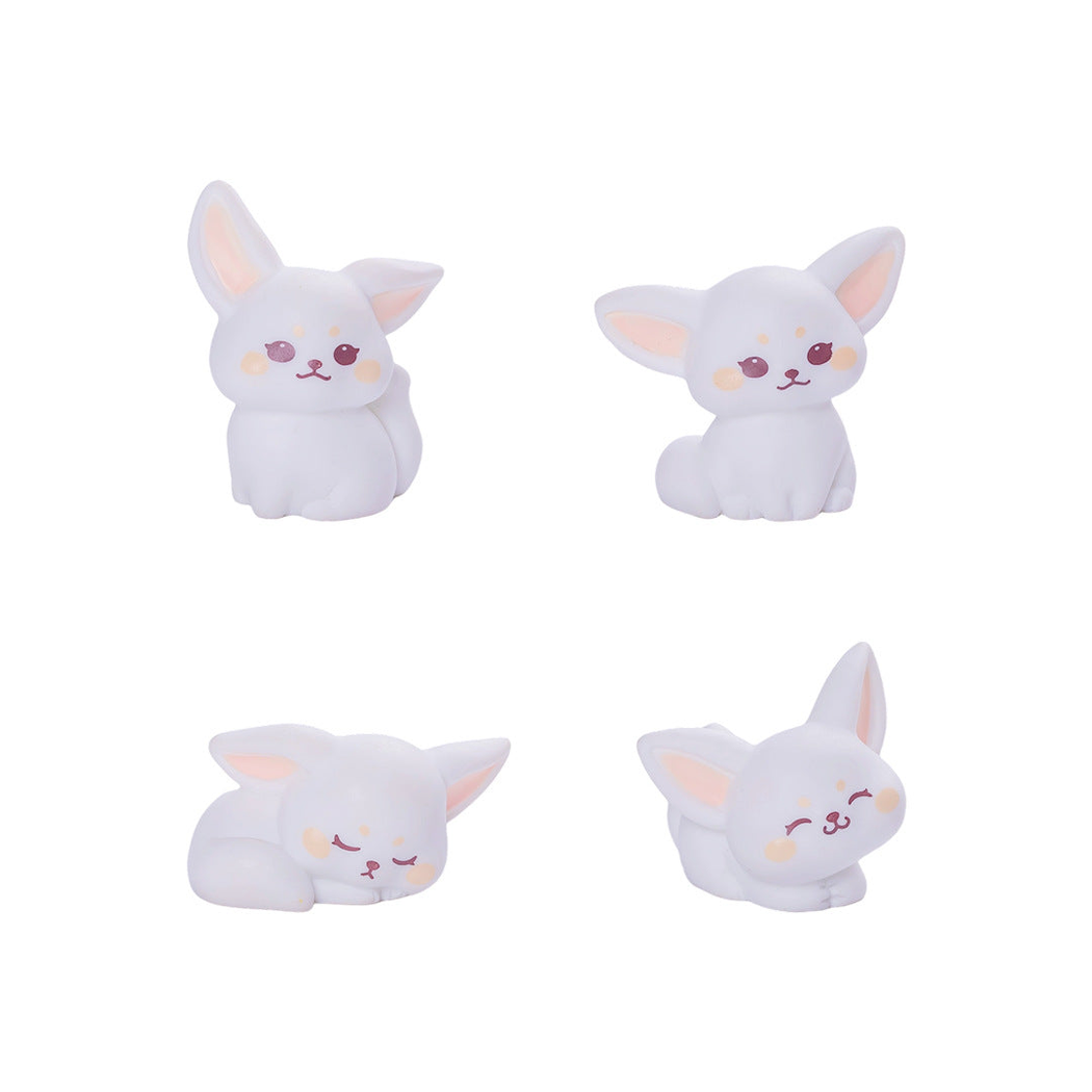 objella tiny orange four pose fox figurine complete product display