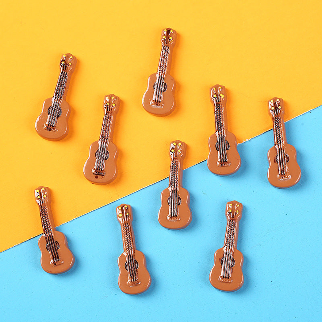 chivy - mini guitar violin instrument embellishment staged product scene