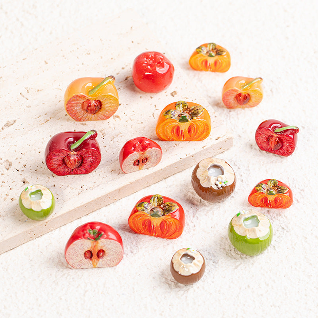 objella - colorful fifteen-style fruit miniature staged product scene