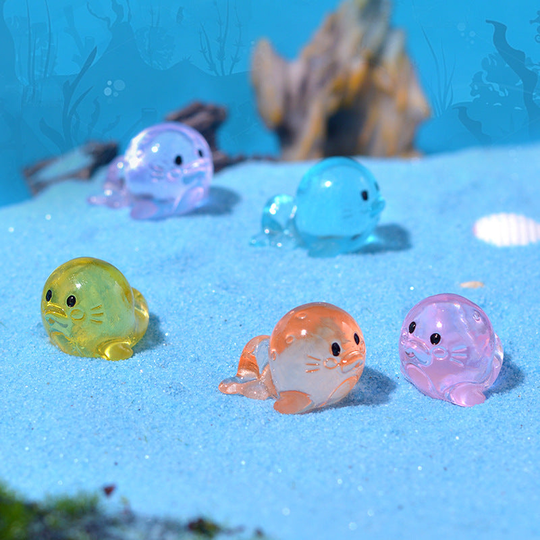 objella - colorful six-style sea lion figurine staged product scene