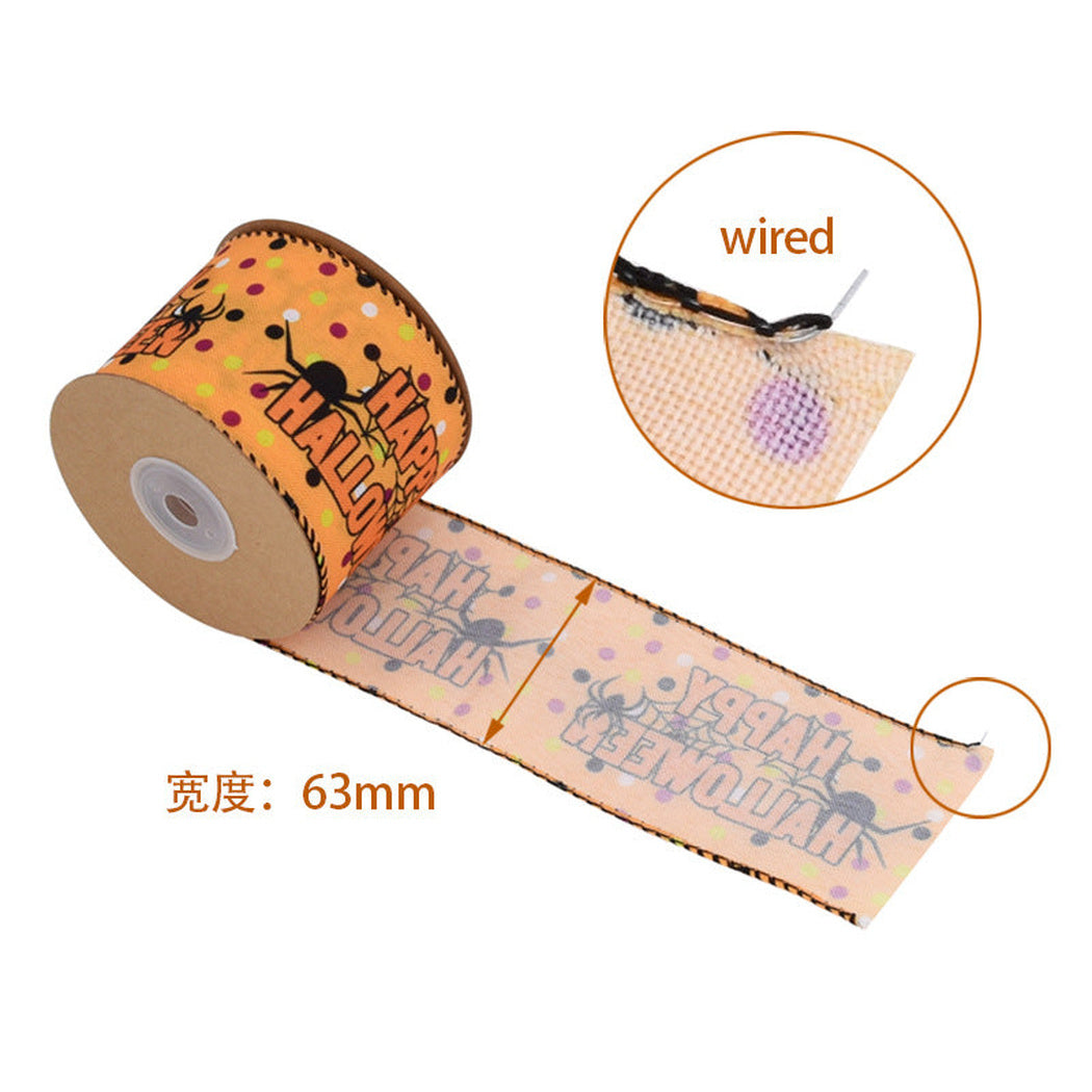Orange 63 mm wired Halloween ribbon spool with edge close-up