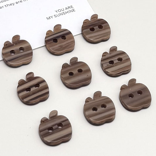 Brown striped apple-shaped buttons with two holes, front view