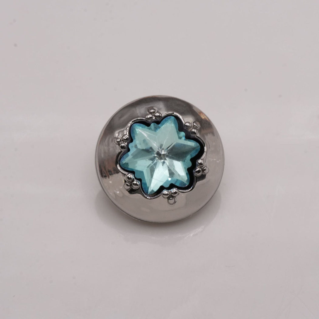 Aqua star-center button with a silver-tone round rim