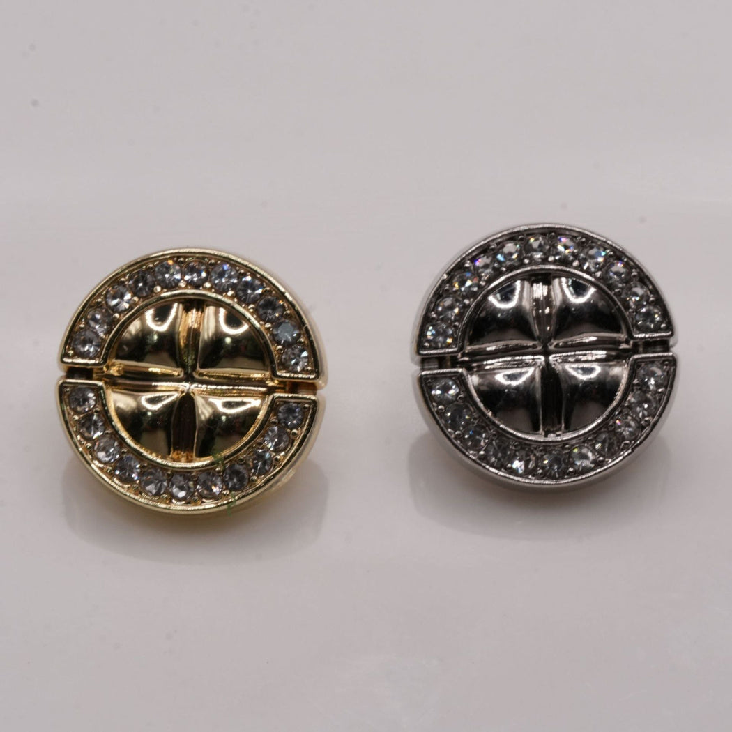 Gold-tone and silver-tone segmented round buttons with clear perimeter accents