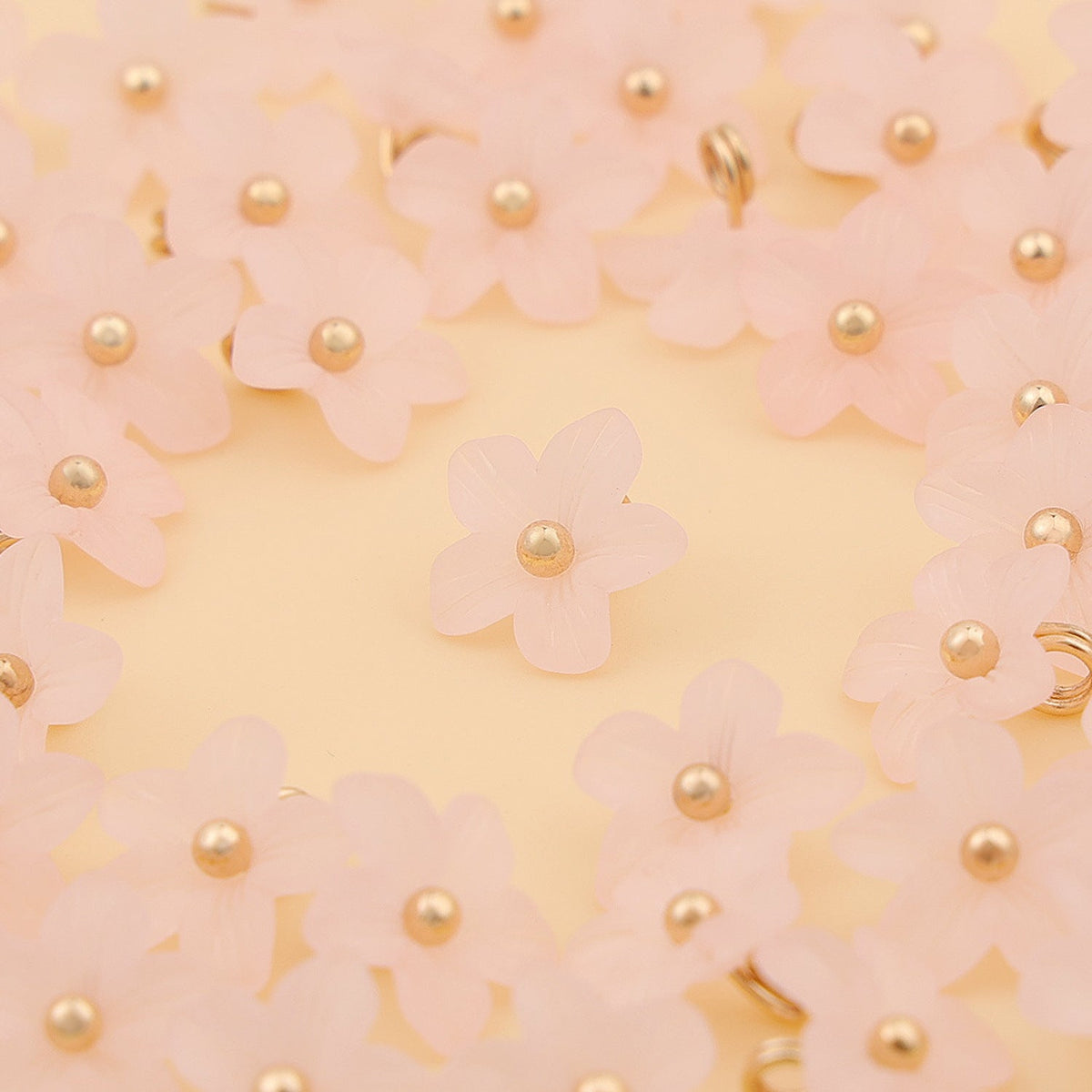 Peach pink five petal shank buttons