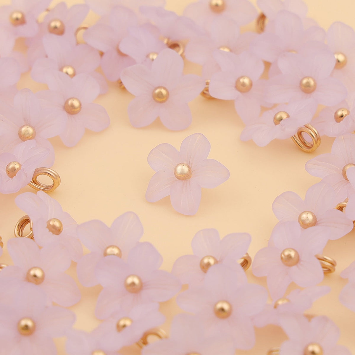 Pale lilac five petal shank buttons