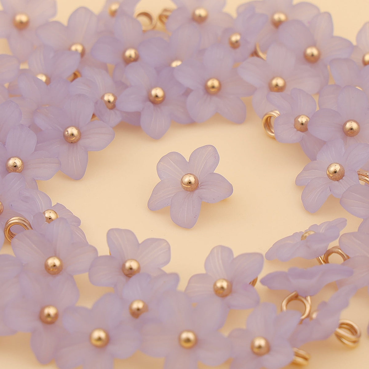 Soft purple five petal shank buttons