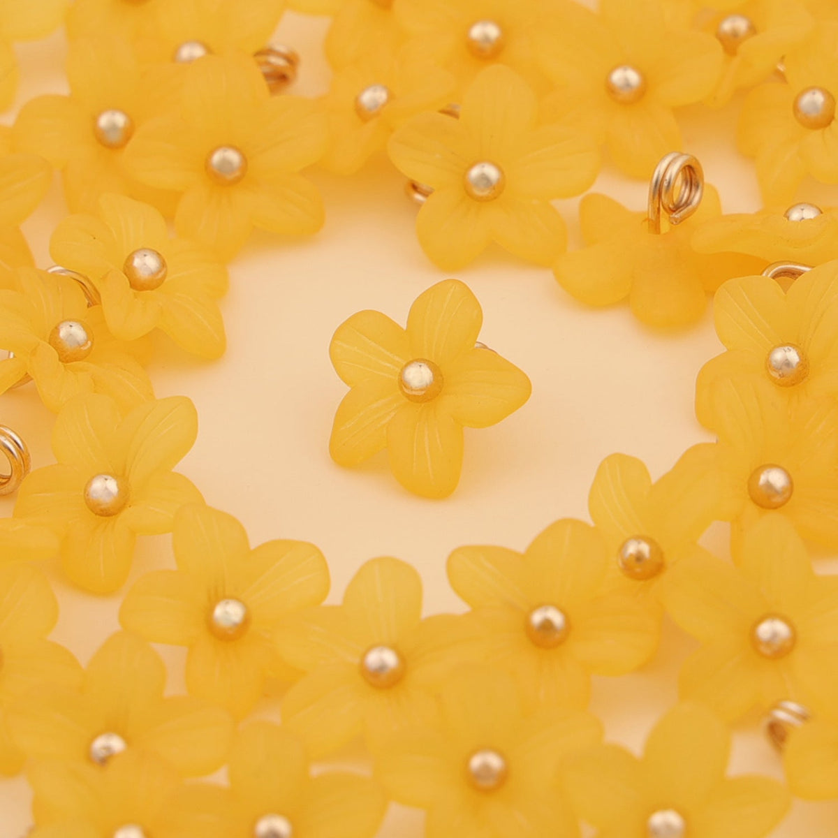 Amber yellow five petal shank buttons