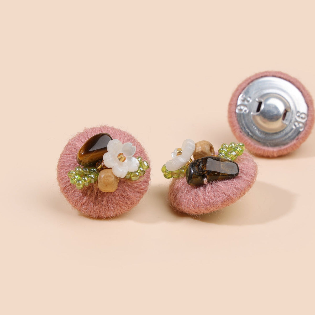 Dusty pink beaded floral round button from three views