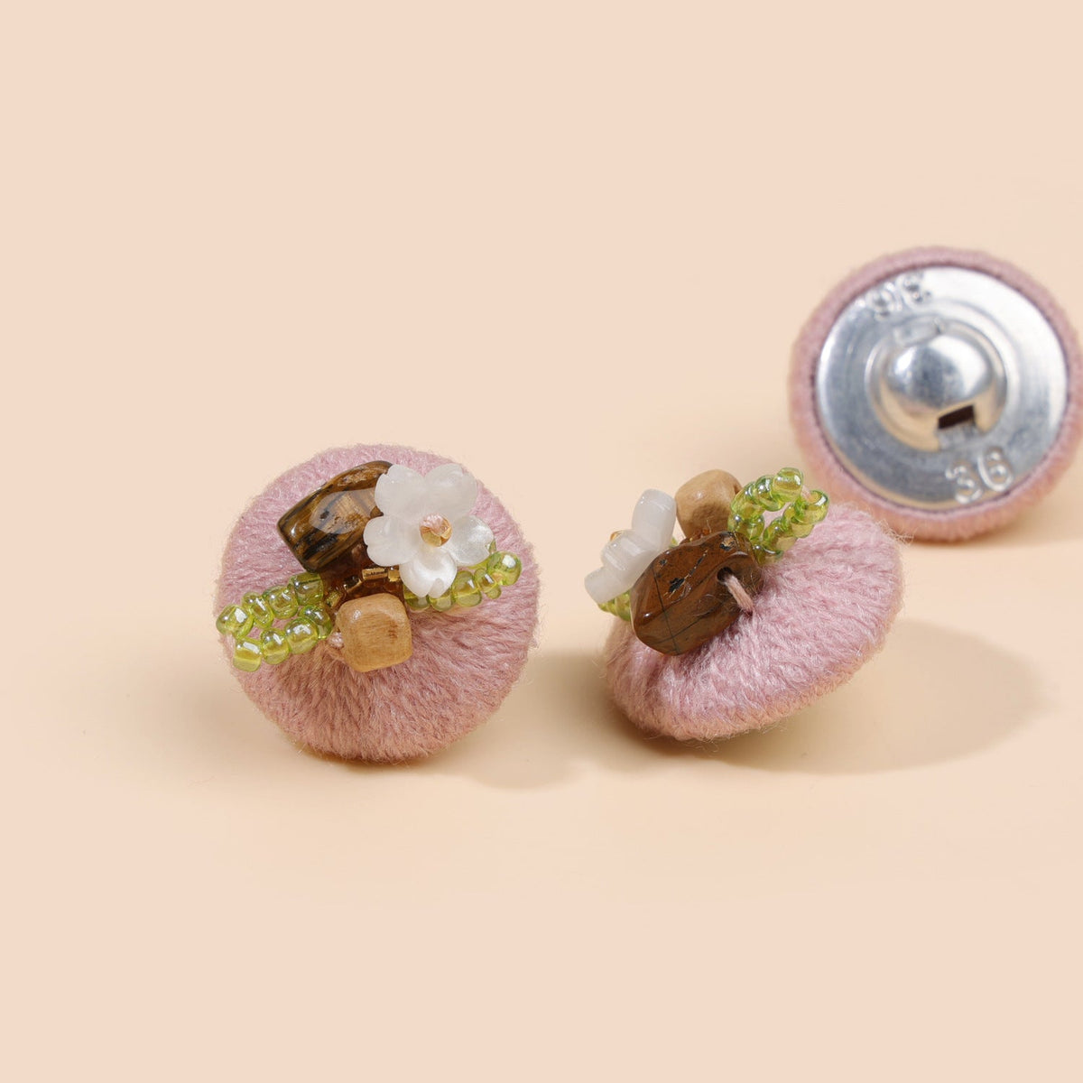 Rose pink beaded floral round button from three views
