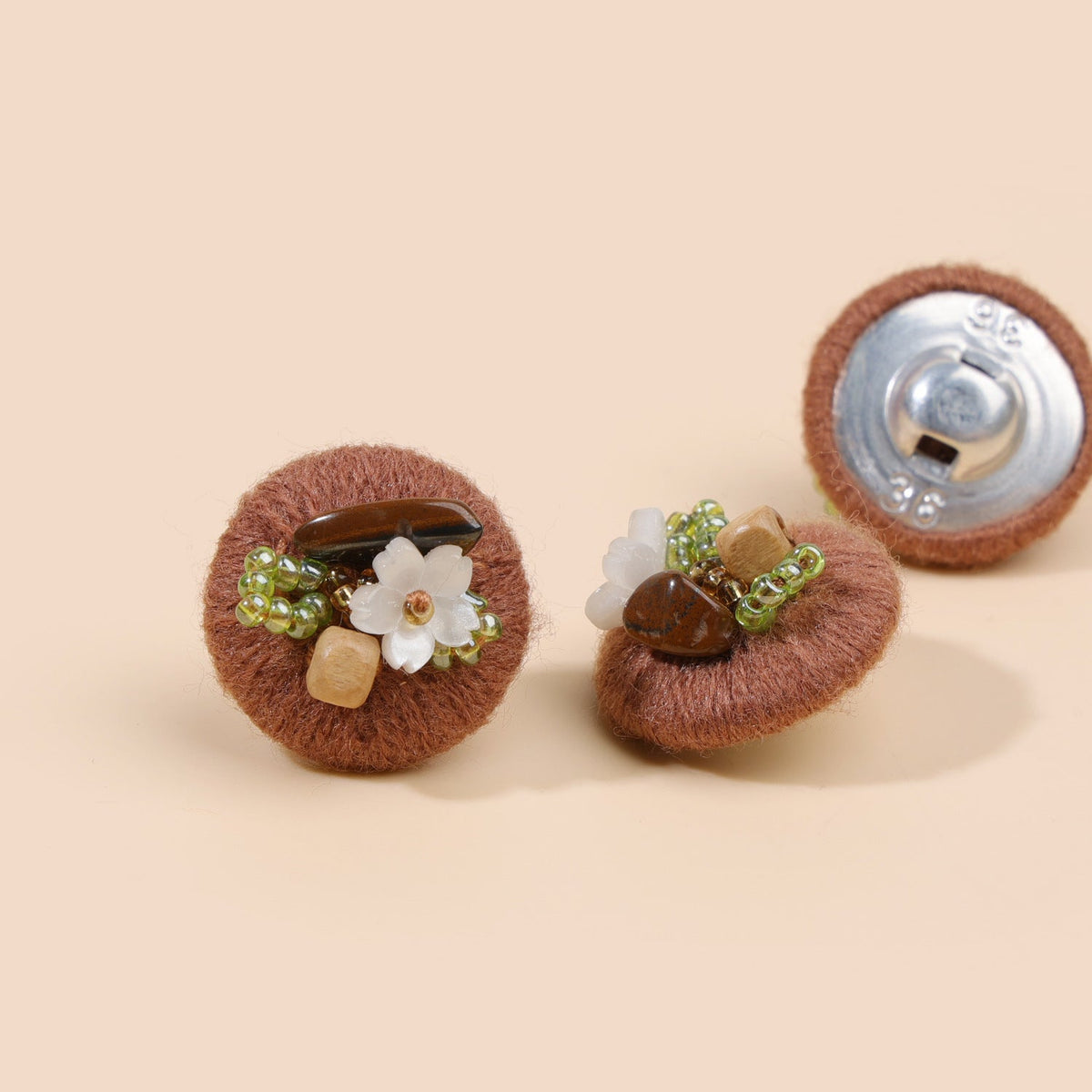 Auburn beaded floral round button from three views