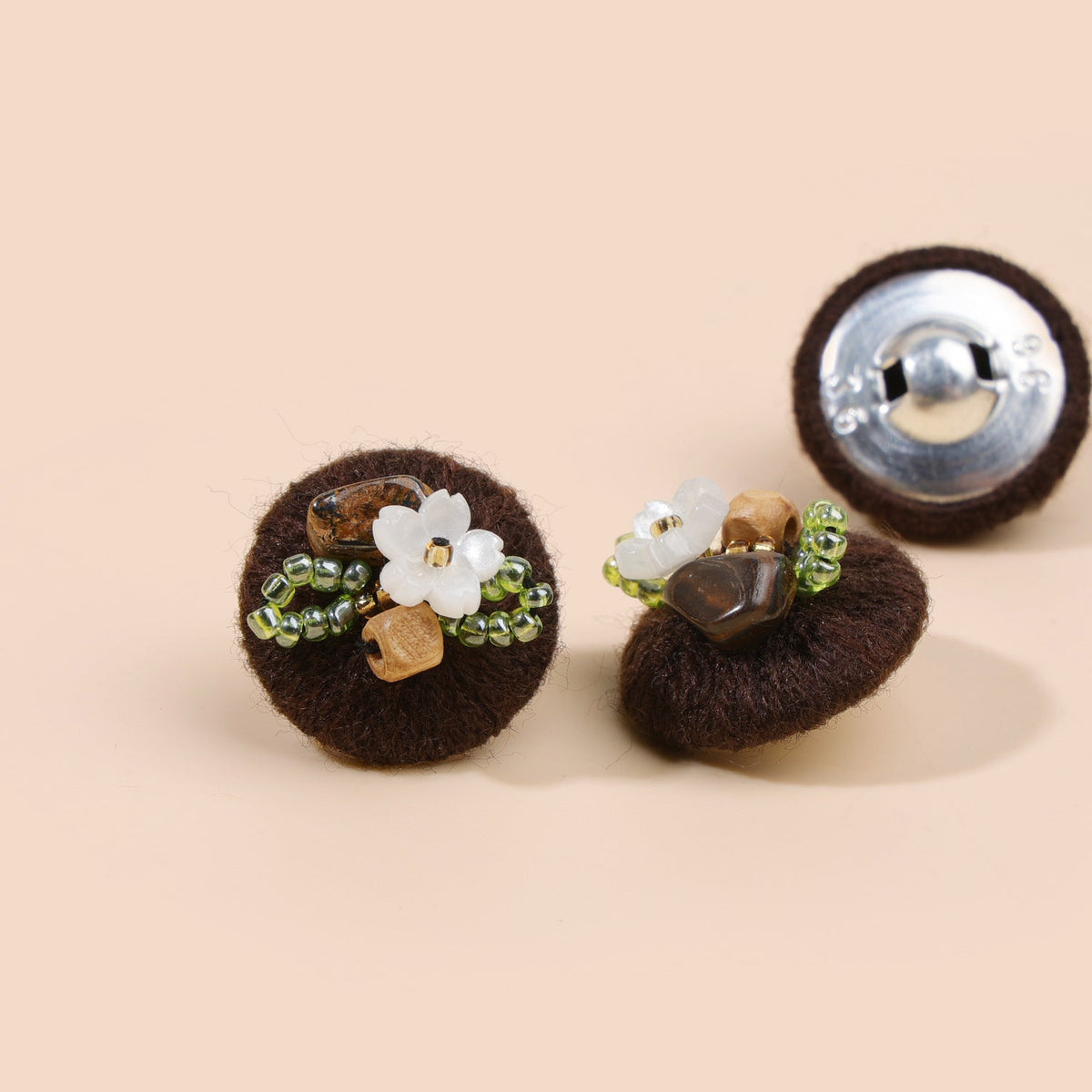 Dark brown beaded floral round button from three views