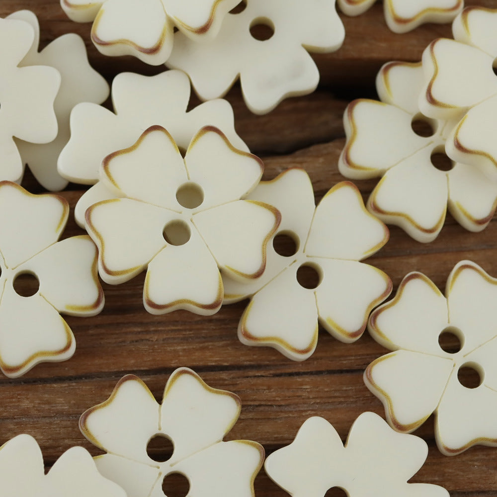 Ivory layered petal two hole buttons