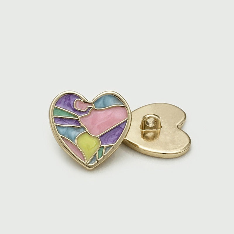 Purple and blue heart-shaped shank button with abstract color panels, shown front and back