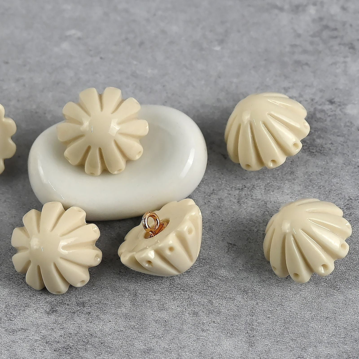 Cream fluted dome buttons with raised loop backs