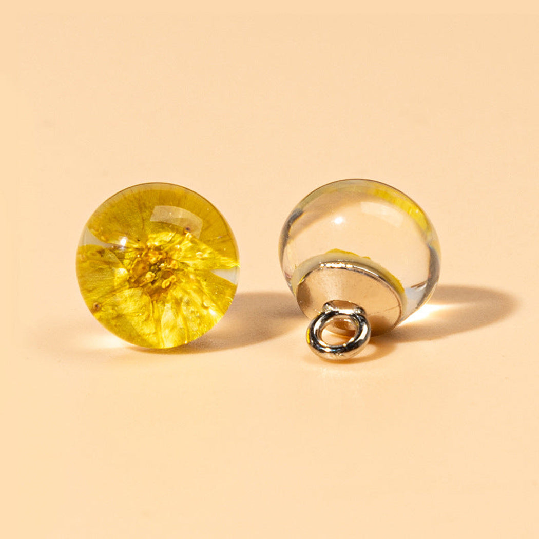Yellow botanical orb shank button front and back
