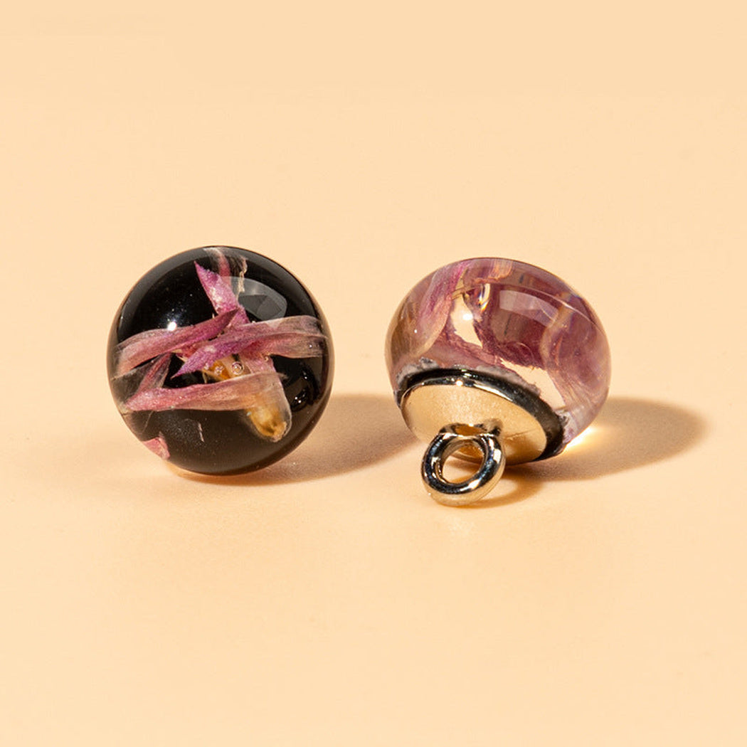 Black and pink botanical orb shank button front and back