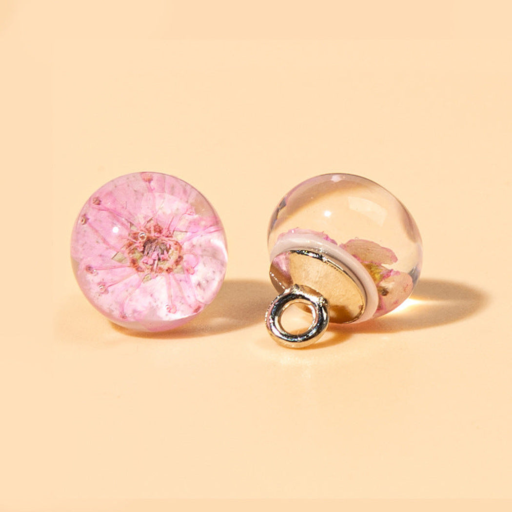 Pink botanical orb shank button front and back