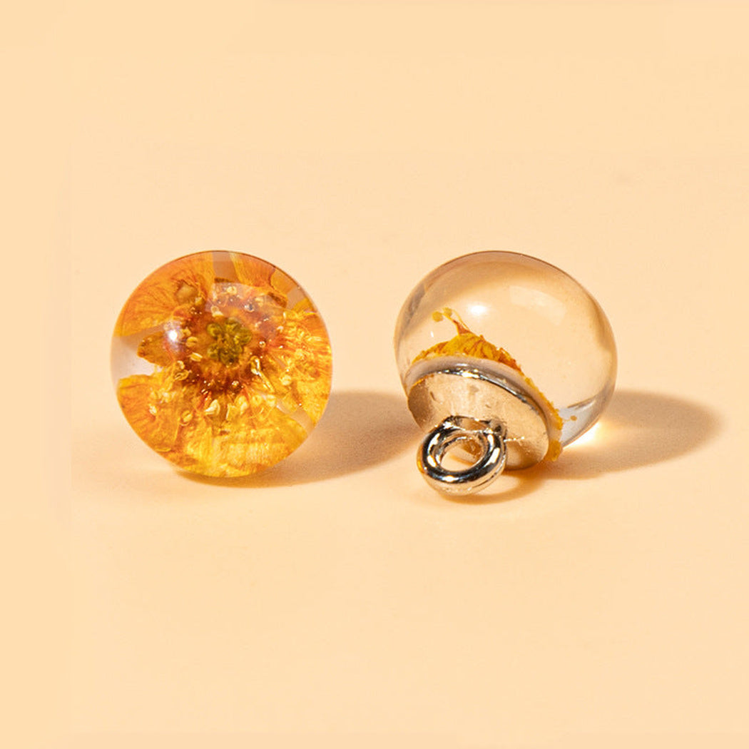 Orange botanical orb shank button front and back