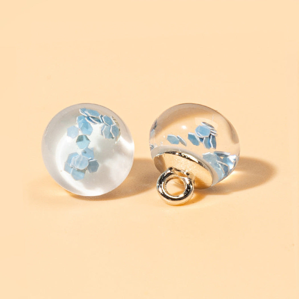 Light blue reflective flake orb shank button front and back