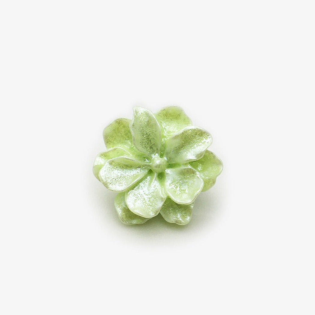 Green sculpted blossom shank button front view