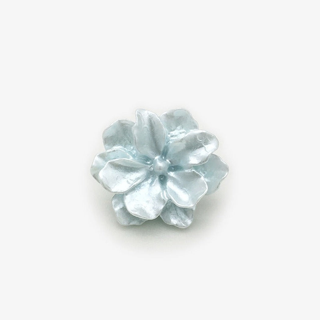 Blue sculpted blossom shank button front view