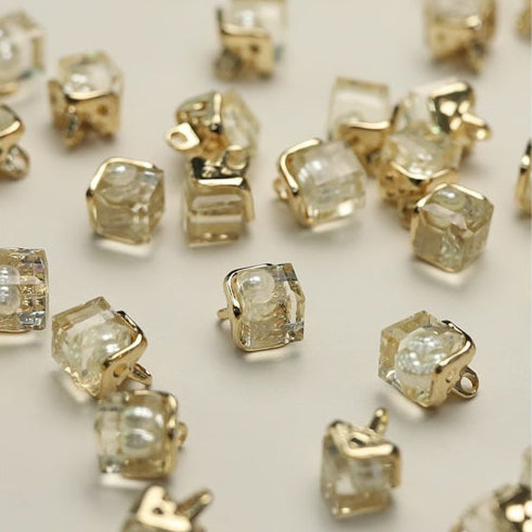 White orb clear square shank buttons